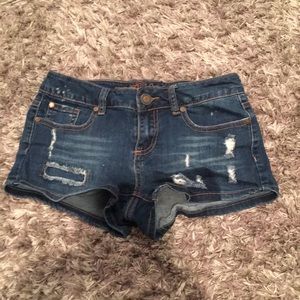 NEW CONDITION. Denim shorts light distressing.